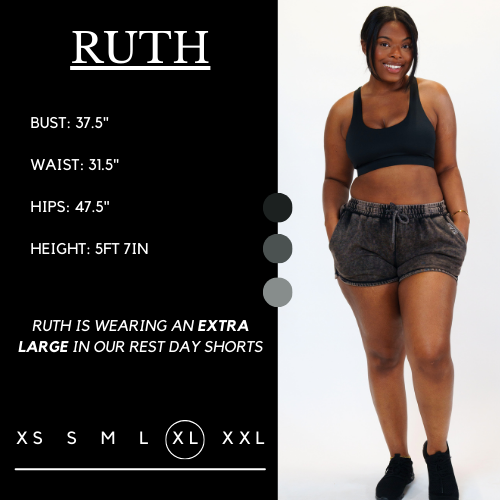 Model's measurements of 36 inch bust, 33 inch waist, 50 inch hips, and height of 5 foot 7 inches. She is wearing a size extra large in these shorts