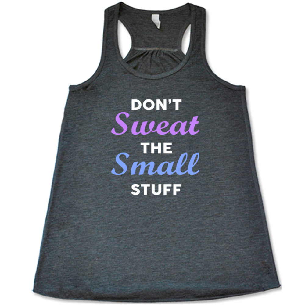 grey shirt with the quote "Don't Sweat The Small Stuff" on it