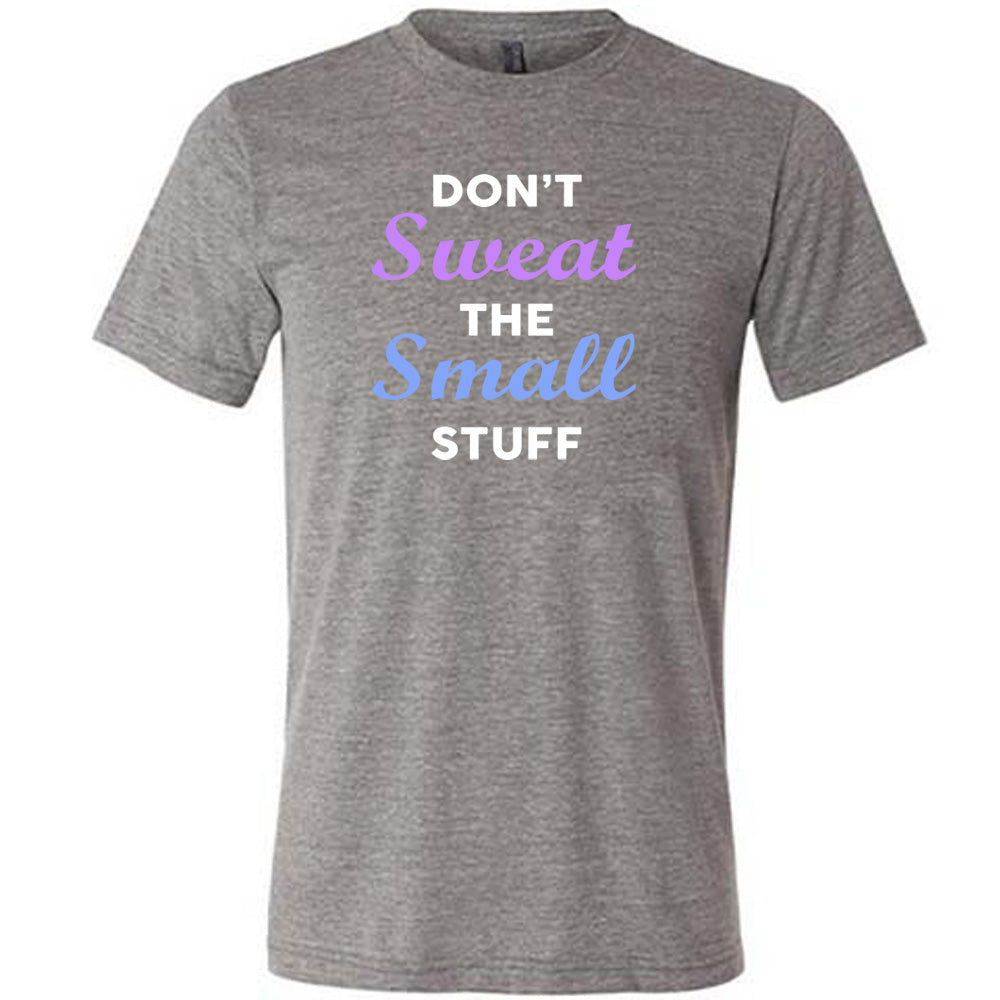 grey shirt with the quote "Don't Sweat The Small Stuff" on it