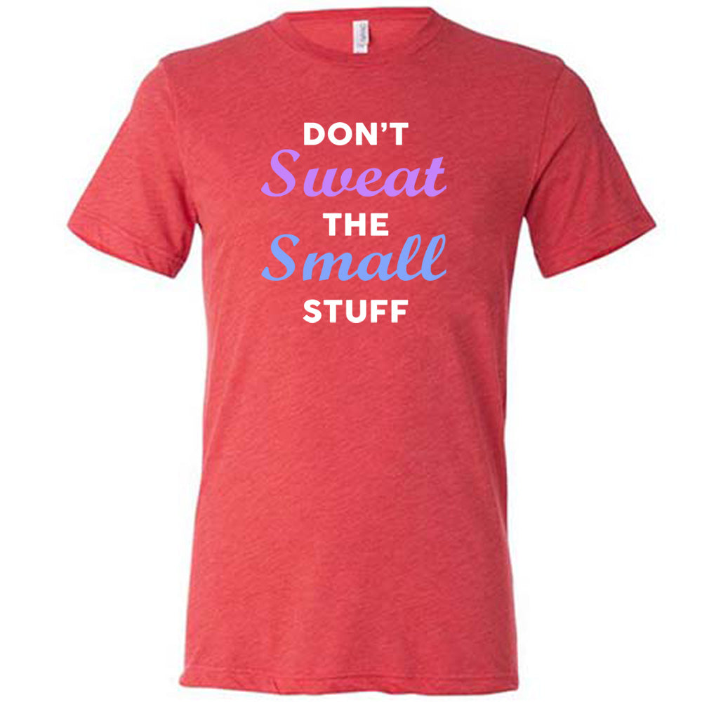 red shirt with the quote "Don't Sweat The Small Stuff" on it