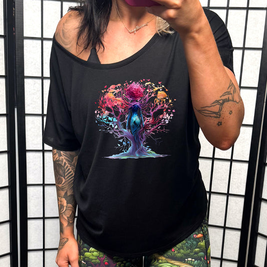 black slouchy shirt with a colorful enchanted tree graphic in the center