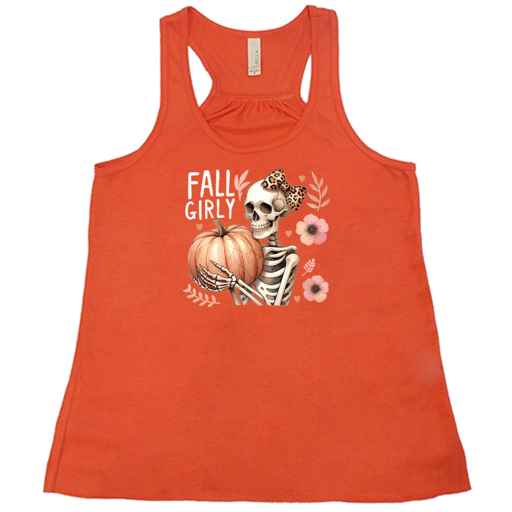 coral shirt with a skeleton and the quote "fall girly" on it