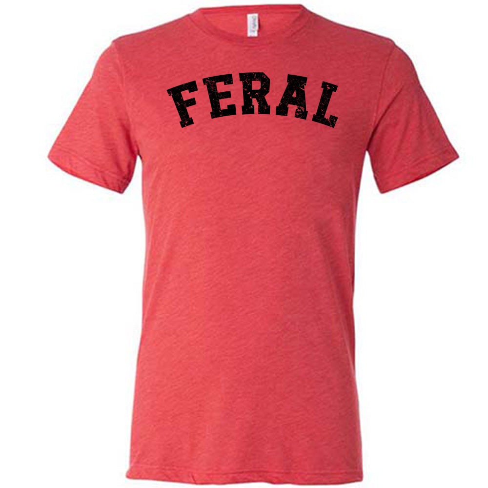 red shirt with the word "feral" in the middle of it