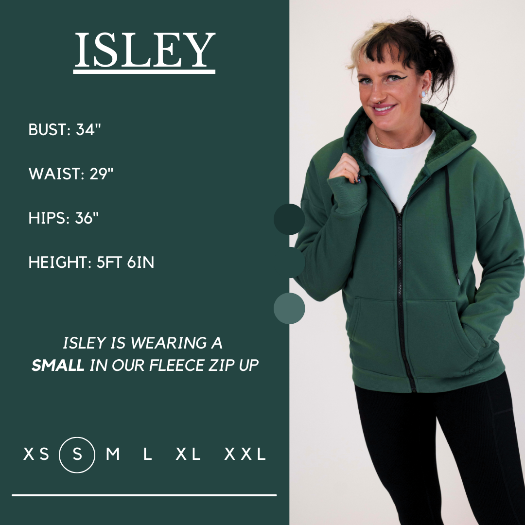 Model’s measurements of 34” bust, 29” waist, 36” hips and height of 5 ft 6 inches. She is wearing a size small in our fleece zip up