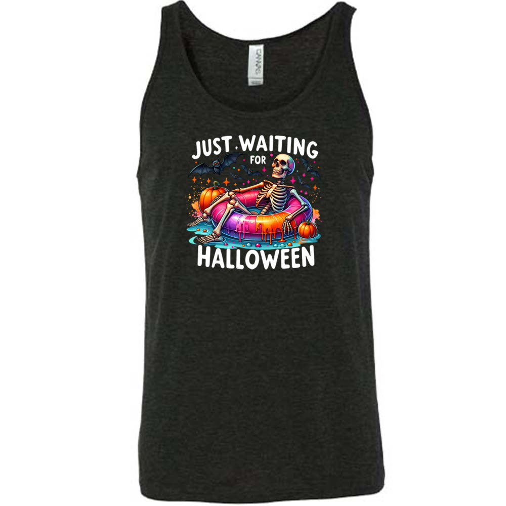 black shirt with a colorful skeleton graphic in the center with the quote "Just Waiting For Halloween" on it