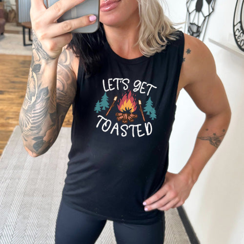 model wearing the black let's get toasted muscle tank