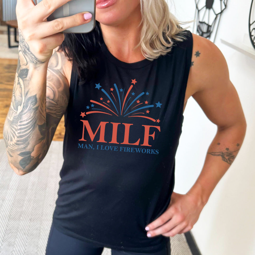 model wearing the black MILF (man I love fireworks) Muscle Tank