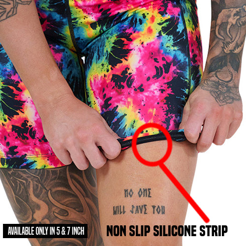 close up of the non slip strip on the neon colorful tie dye shorts