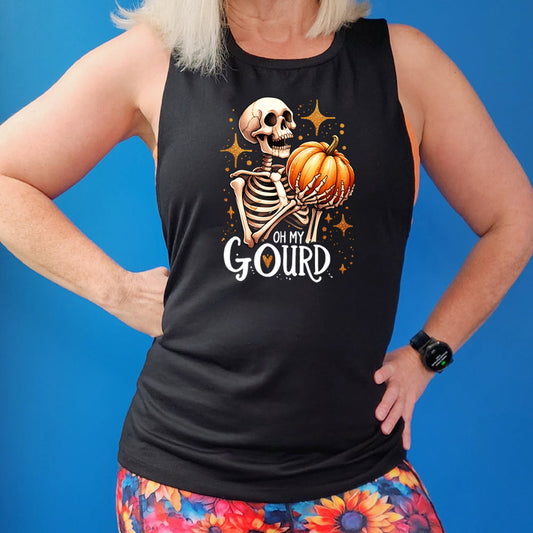 black shirt with a skeleton holding a pumpkin graphic on it