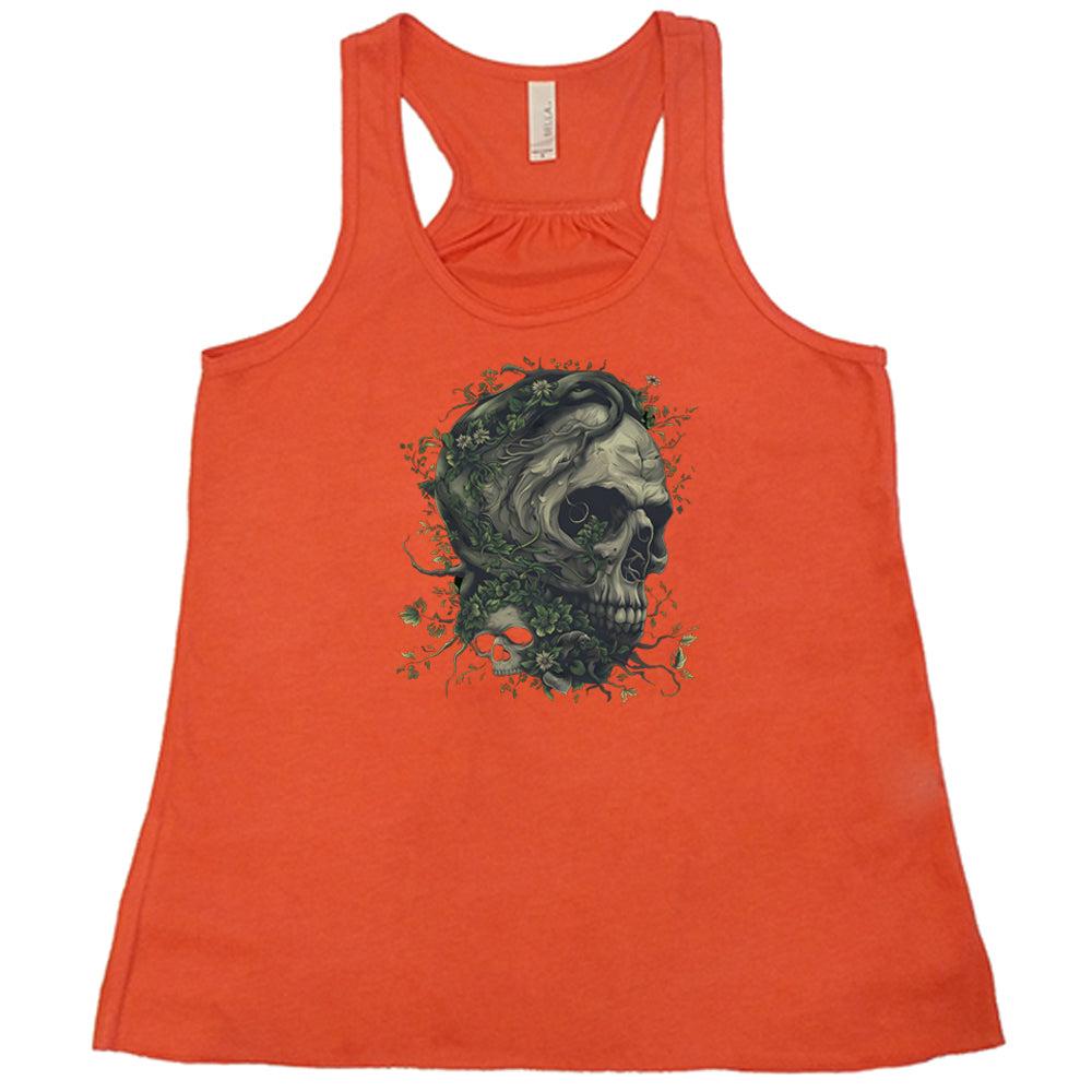 coral shirt with a tree skull graphic in the middle