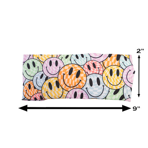 smiley face patterned headband measured at 2 by 9 inches