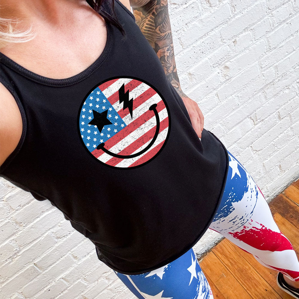 model wearing the black USA Smiley Face Tank Top