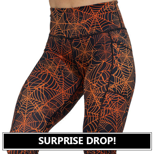 black and orange spider web leggings surprise drop