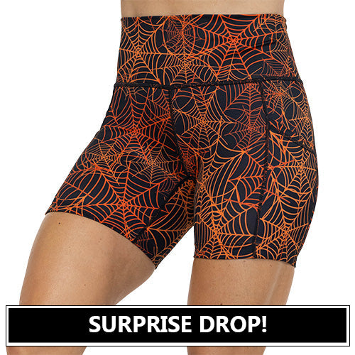 black and orange spider web shorts surprise drop