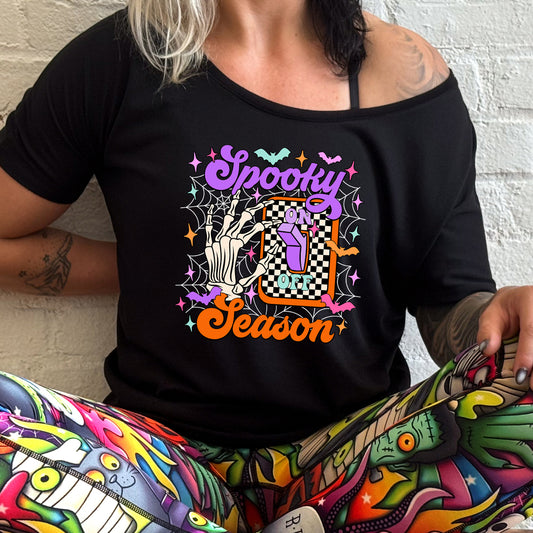 model wearing the Spooky Season Light Switch slouchy shirt