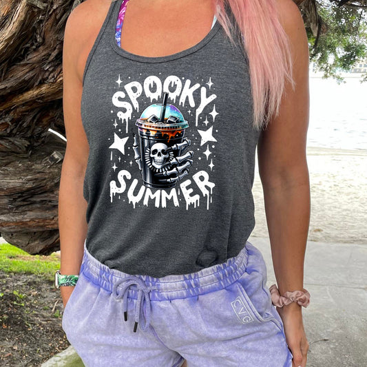 model wearing a grey tank with the saying "spooky summer" and a design of an iced coffee with a skull