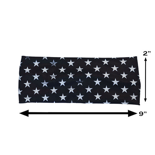 the black headband with white stars measured at 2 by 9 inches