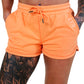 model wearing the orange shorts