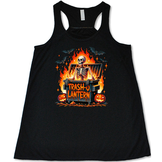 black shirt with a skeleton graphic and the quote "trash-o lantern" on it 