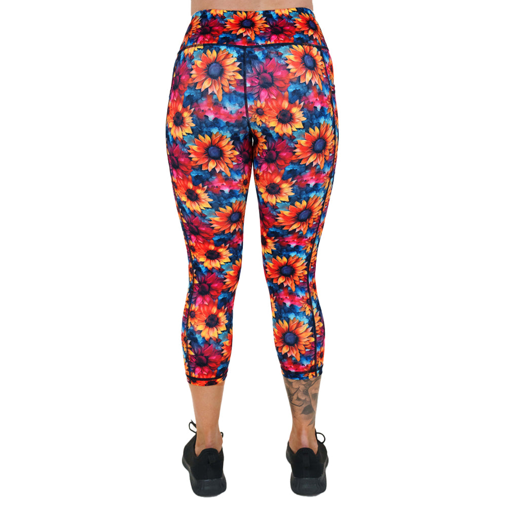 back of capri length colorful sunflower patterned leggings