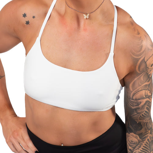 model wearing a solid white sports bra